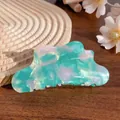 Cloud-shaped acetate hair claw clip with pearlescent mint green and pink marble texture - Iridescent Green