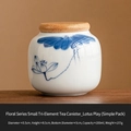 Mini ceramic tea canister with blue lotus pattern and wooden lid for loose leaf tea - Dehua White Hand Painted Playful Lotus - Jar