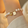 Natural freshwater pearl bracelet with gold heart charm and Good Luck tag for women - Pearl Bracelet with Good Luck Plate (T-d-017)