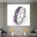 Stainless steel spinner ring featuring a rotatable rainbow chain inlay for stress relief - Steel Base Colored Chain