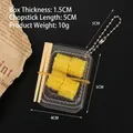 Miniature dollhouse food model featuring four yellow corn pieces in a small plastic box - Box + Chopsticks + 4 Corns