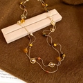 Détails de collier multicouche vintage avec perles de pierre et anneaux dorés polis - Jaune-Café