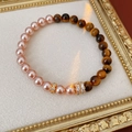 Close-up of tiger eye and pink pearl beaded bracelet with gold rhinestone spacers - Pink-Coffee Color (Real Gold Plating)