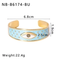 Detailed view of evil eye enamel cuff bangle with dimensions 6.8cm and gold star patterns - Blue Evil Eye Style (NB-B6174-BU)