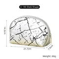 Detailed view of marble pattern shell makeup bag with size dimensions and silver zipper - X-194 Shell Shape Silver
