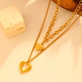 Collar de doble capa en acero dorado 18k con colgantes de corazón sólido y hueco - Estilo de corazón sólido y hueco de doble capa (I802) / Dorado