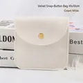 Elegant off-white velvet jewelry pouch 10x10cm with golden snap button closure - 10x10cm / Off-white