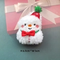 Close-up of a plush snowman charm with red hat and scarf, measuring H 6.5cm x W 5cm - Adjustable / Snowman