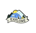 Adventure camping enamel pin featuring a tent, snow mountains, and Explore text - EXPLORE Ribbon