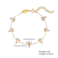 Pulsera de acero inoxidable dorado con dijes de flores de circón y cadena ajustable - Estilo Floral Dorado (B2592-GO)