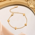 Elegante collana in acciaio al titanio dorato con quattro piccoli ciondoli a cuore - Bracciale a Cuore (Oro)