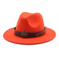 Detail of orange fedora hat featuring a brown leather band and antique floral metal buckle - Orange Red