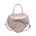 Sac à main rose en forme de cœur avec nœud décoratif et deux breloques cœurs - Rose