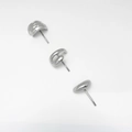 Close-up of polished silver geometric stud earrings in wavy spiral and curved shapes - 3-Piece Stud Earring Set / Silver