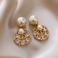 Vintage oval water drop earrings with white pearls and gold CD logo pendants - Gold CD Logo Style