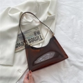 Brown semi-transparent jelly baguette bag in PVC material with a sleek zipper - Caramel color