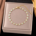 Elegant gold plated flower bracelet with sky blue enamel details and lobster clasp - Gold Blue Flower Enamel Bracelet