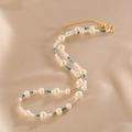 Double-layered natural pearl necklace with turquoise beads and gold tube accents - Freshwater Pearl Style
