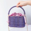 Purple woven bucket bag with satin drawstring and pearl bow handle for evening wear - Purple