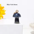 Mini mushroom pendant carved from blue sodalite stone with a golden metal loop - Blue Sodalite