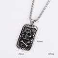 Detail view of silver skull dog tag pendant with 42mm x 25mm dimensions and 40g weight - Skull Tag Style (3)