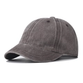 Detailed close-up of a washed charcoal cotton short brim baseball cap with vintage finish - Adjustable / Coffee