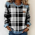 Close-up of plaid patchwork denim stitching on women's loose crewneck sweatshirt - 3XL / Black