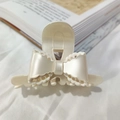 Elegant cream-white acetate hair claw clip with delicate lace bow design for women - Satin White