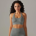 Detailed texture of seamless ribbed grey yoga bra with halter neck and high-waist leggings - Dark Gray