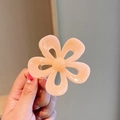 Close-up of peach jelly camellia hair claw clip with transparent acrylic petals - 2# Jelly Orange