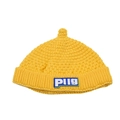 Detailed knit texture of a yellow baby beanie featuring a colorful PUG letter patch - Yellow