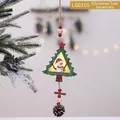 Wooden glowing Christmas tree ornament with snowman illustration and a pine cone - Tree Snowman