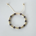 Detail of beaded bracelet with 18k gold plated metal beads and purple crystal cubes - Purple