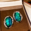Vintage bow earrings featuring oval green stones with silver setting in a jewelry box - 63# Silver Green Rhinestone Geometric Resin Studs