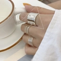 Minimalist wide silver ring in polished finish worn on finger with stacked styling - JZ0365 (Wide Smooth)