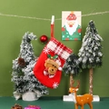 Dettaglio di calza natalizia rossa con bordo a quadri e decorazione orso in peluche - Stile Campanella Piccola Orso (E3-1)