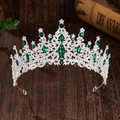 Close-up of silver bridal crown featuring brilliant clear and green crystal stones - Silver with Green Rhinestone