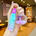 Detail of Kuromi liquid sand keychain with purple glitter and blue gradient wrist strap - Gradient Strap TV Shape White Character
