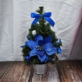 Miniature artificial Christmas tree in a silver basket featuring blue flowers and bows - 30cm / Blue
