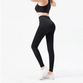 Leggings de yoga noirs sans couture à taille haute avec effet sculptant fessier - Noir