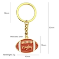 Porte-clés de rugby rouge en métal doré avec dimensions et spécifications de poids - Ballon de Rugby Plat