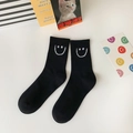 Classic black mid-calf socks with white knitted smiley face pattern in soft cotton - One Size / Black Big Smiley