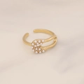 Detailed view of a gold safety pin open ring with small pearls on white marble background - Safety Pin Pearl Style (8#)
