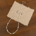 Detail view of pearl necklace with silver chain, adjustable extender and lobster clasp - Bright Pearl Silver Necklace