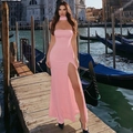 Detail of pink strapless slim dress featuring a high side slit and matching neck scarf - S / Pink