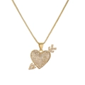 Detailed view of a gold-plated heart and arrow pendant with sparkling crystal inlay - Heart with Arrow