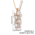 Detailed view of gold bar pendant with teardrop zircons and precise size measurements - Gold-White Zirconia