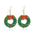 Close-up of green Christmas wreath earrings with red bow and colorful rhinestones - Cloud Dangle Blue