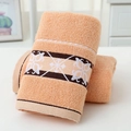 Absorbent apricot cotton towel with decorative brown geometric jacquard border detail - Cotton Flower Bloom Brown (Towel)