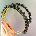 Detail of handmade gold wire-wrapped black raw stone hoop earrings for women - Obsidian Gold Wire Gold Headband